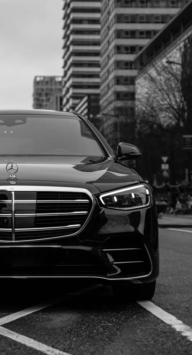 A Mercedes S-Class on the Zuidas in Amsterdam for SilverDrive private chauffeurs