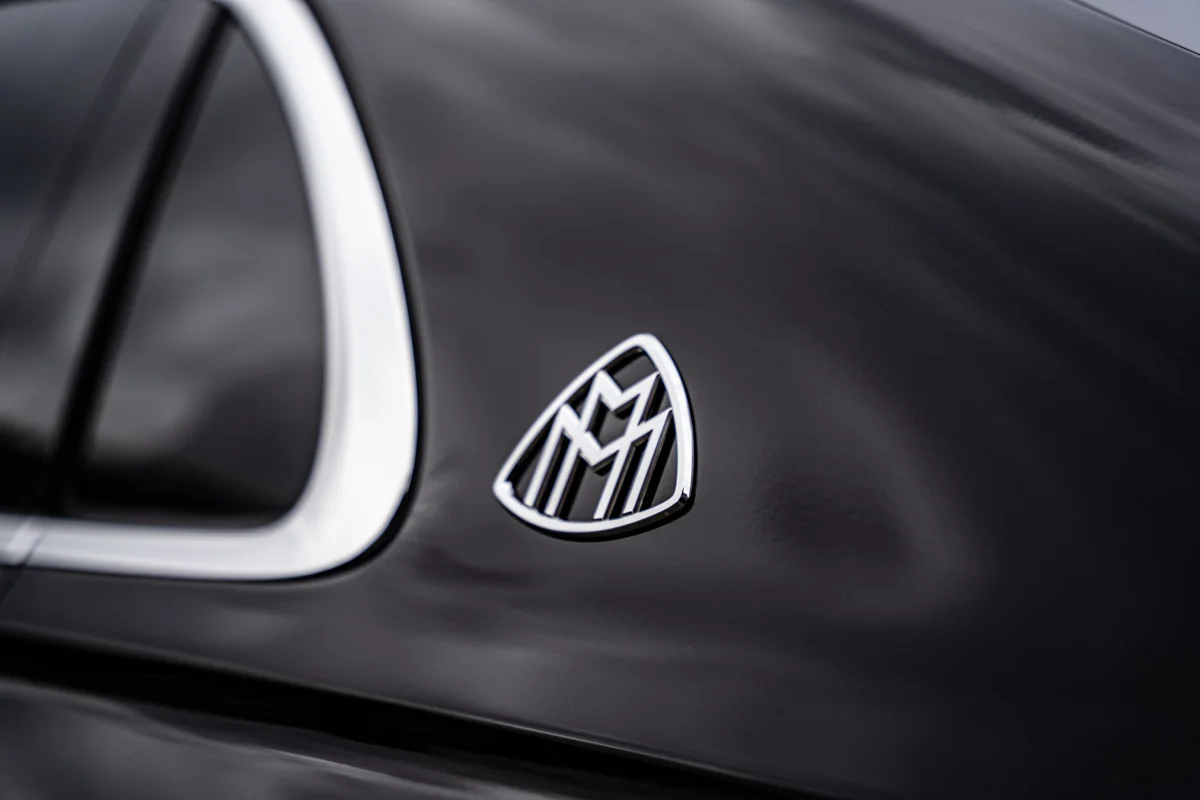 Beautiful Maybach logo on the back side of the luxury vehicle.