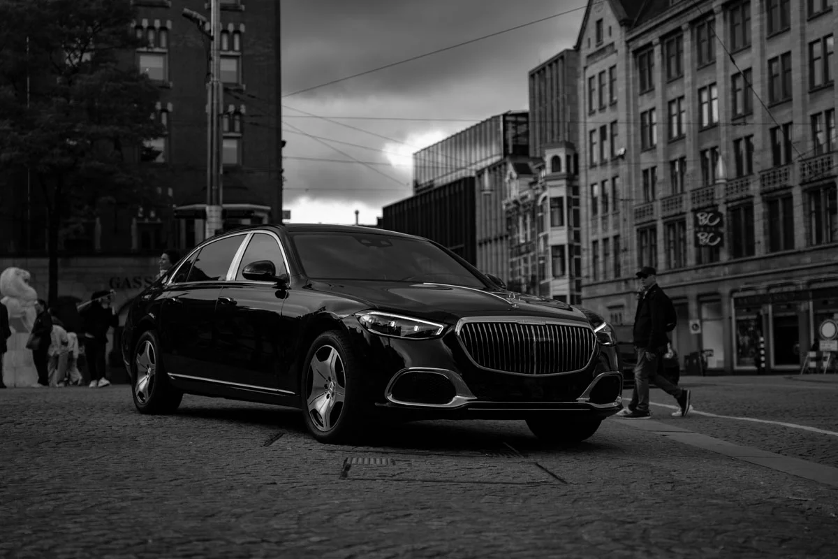 Frankfurt chauffeur service maybach standing in front of a building